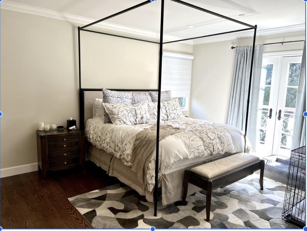 1120 Southdown Road Hillsborough, CA 94010 - Photo 8 of 12 a bed sitting in a bedroom next to a window