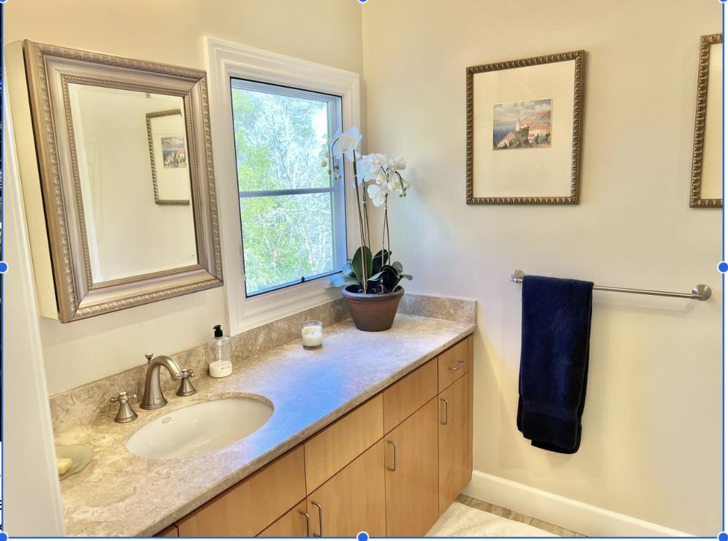 1120 Southdown Road Hillsborough, CA 94010 - Photo 9 of 12 a bathroom with a granite countertop sink and a mirror