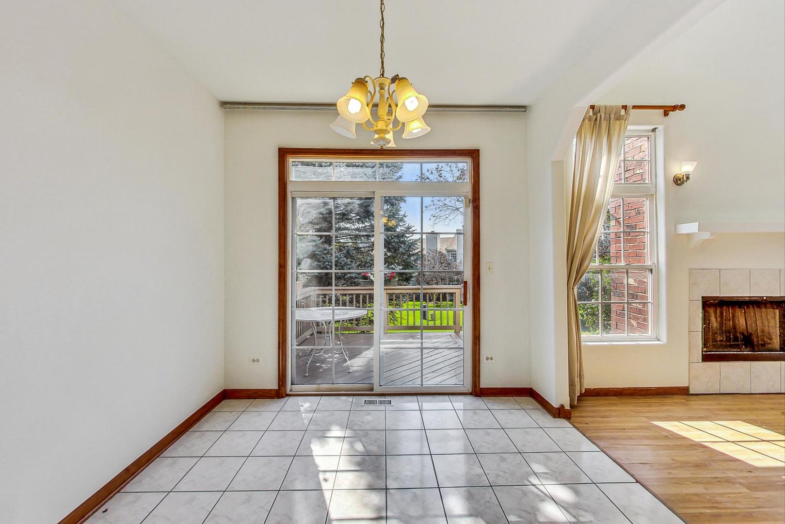 565 Goodwin Drive Bolingbrook, IL 60440 - Photo 9 of 44 a view of an empty room with a window