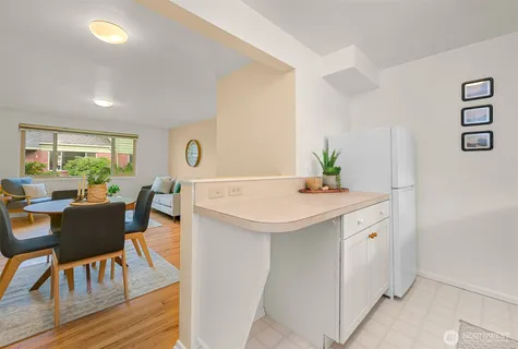 a bathroom with a sink a toilet and vanity