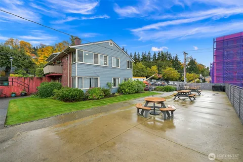 a view of a patio with a table and chairs