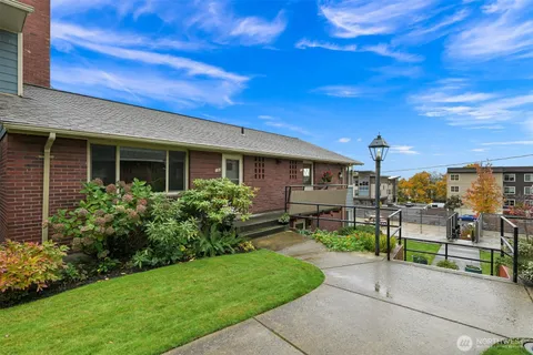 a front view of a house with a garage