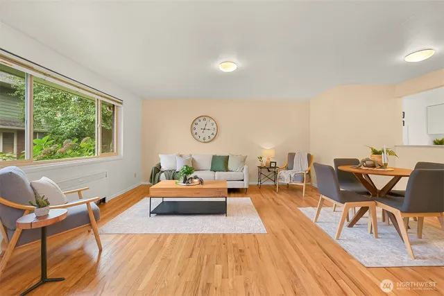 a living room with furniture and a table