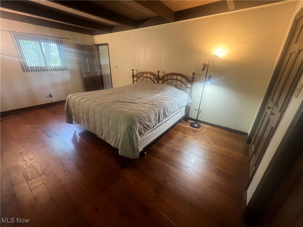 86301 North Bay Road Scio, OH 43988 - Photo 29 of 50 Bedroom with wood ceiling, hardwood / wood-style floors, and beamed ceiling