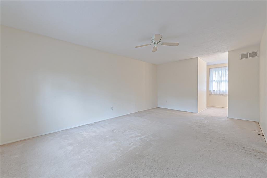 5830 Claridge Export Road Export, PA 15632 - Photo 15 of 25 a view of an empty room and a ceiling fan