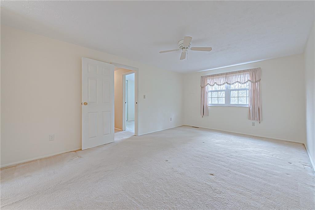 5830 Claridge Export Road Export, PA 15632 - Photo 16 of 25 an empty room with windows and closet