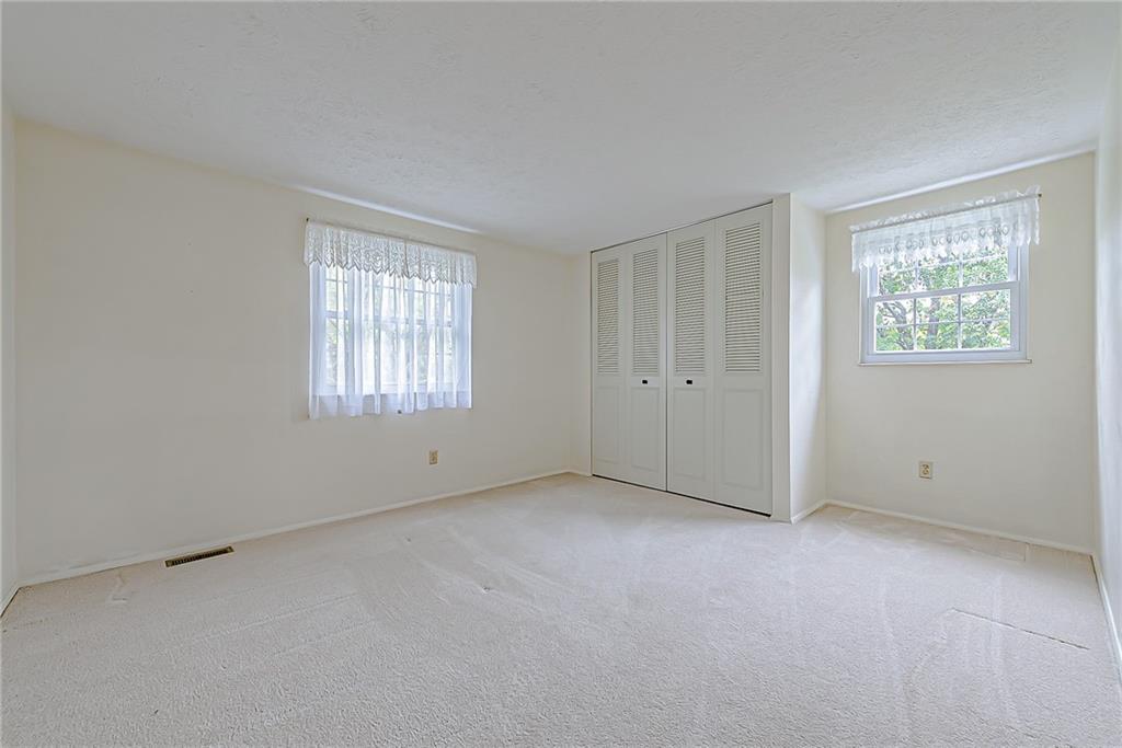 5830 Claridge Export Road Export, PA 15632 - Photo 21 of 25 an empty room with windows