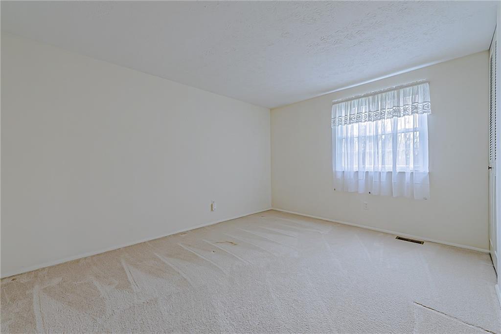 5830 Claridge Export Road Export, PA 15632 - Photo 22 of 25 an empty room with a window