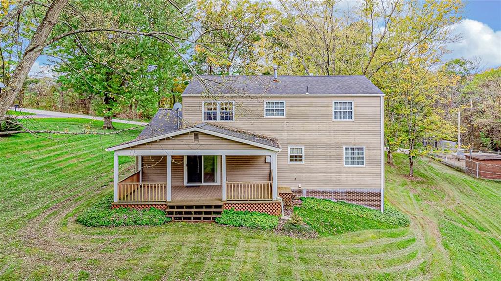 5830 Claridge Export Road Export, PA 15632 - Photo 24 of 25 a view of a house with a yard