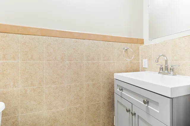 a bathroom with a sink and a shower