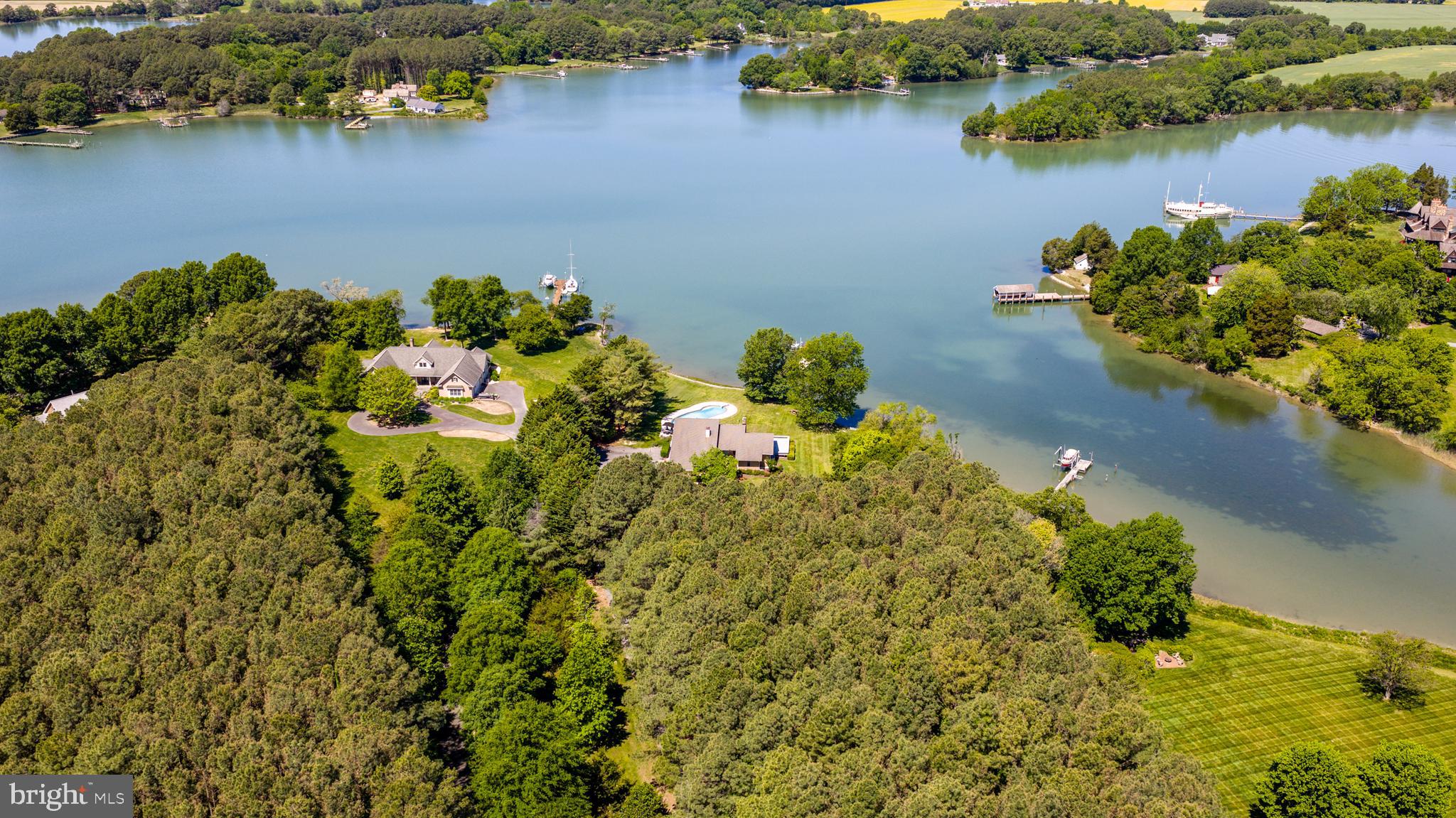 26282 Deep Water Harbor Road Easton, MD 21601 - Photo 39 of 53 an aerial view of a houses with a lake view