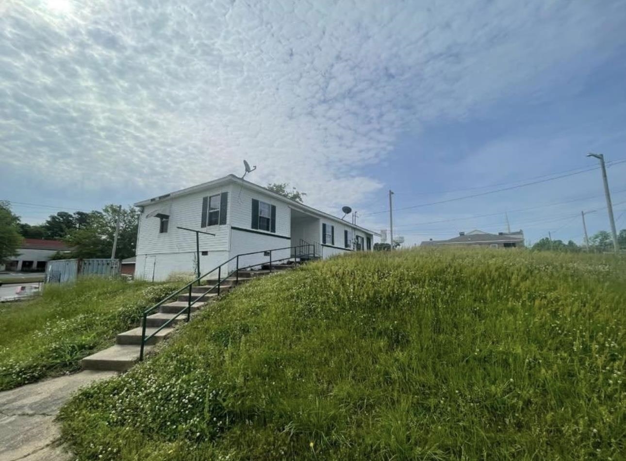 183 North Main Street Ripley, TN 38063 - Photo 1 of 8 a view of a house with a yard