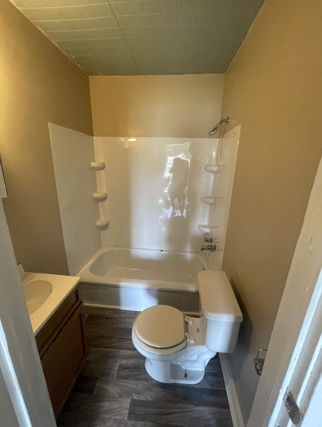 183 North Main Street Ripley, TN 38063 - Photo 4 of 8 a bathroom with a toilet and a shower