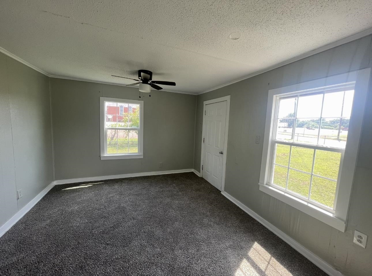 183 North Main Street Ripley, TN 38063 - Photo 6 of 8 an empty room with a window