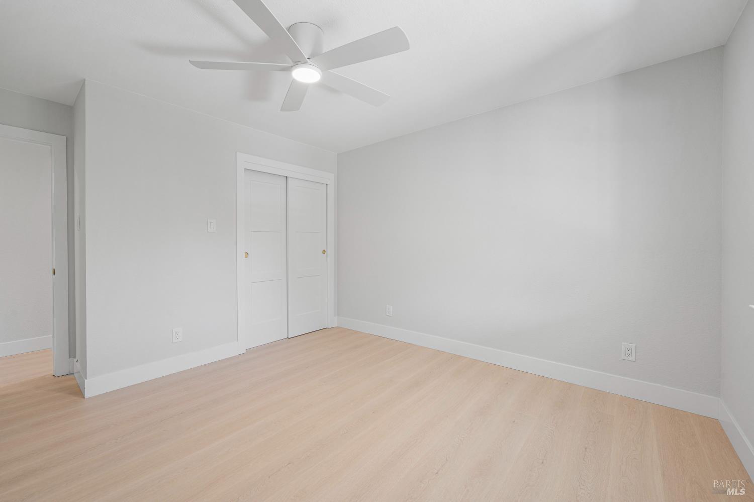 2129 Rockville Road Fairfield, CA 94534 - Photo 29 of 59 an empty room with a ceiling fan and a window