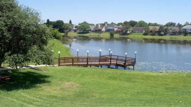 a view of a lake with a big yard