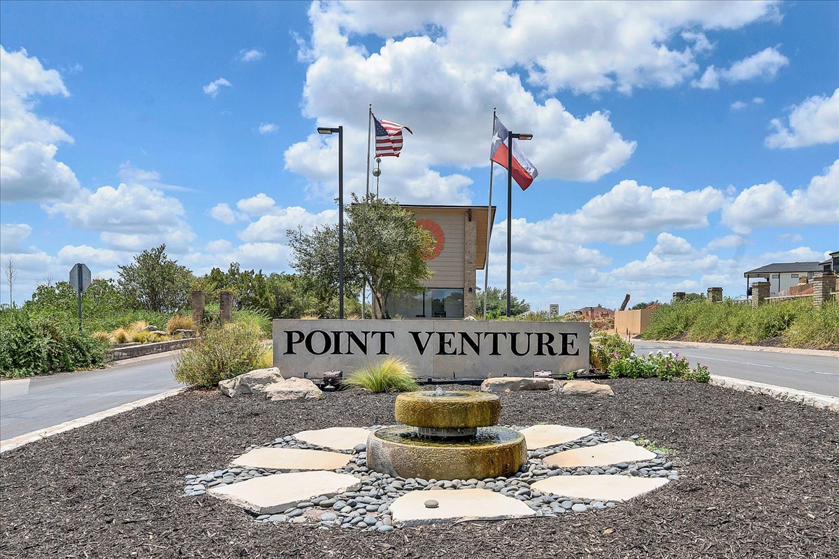 115 Comanche Drive Point Venture, TX 78645 - Photo 28 of 40 View of community / neighborhood sign