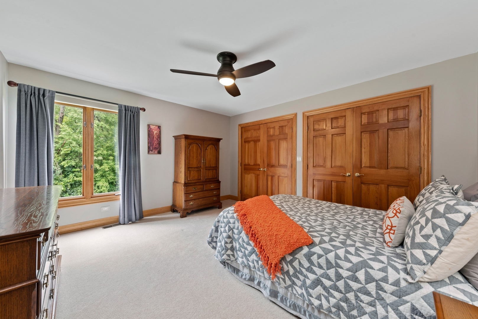 776 North Inverway Road Inverness, IL 60067 - Photo 17 of 31 a bedroom with a large bed and two windows