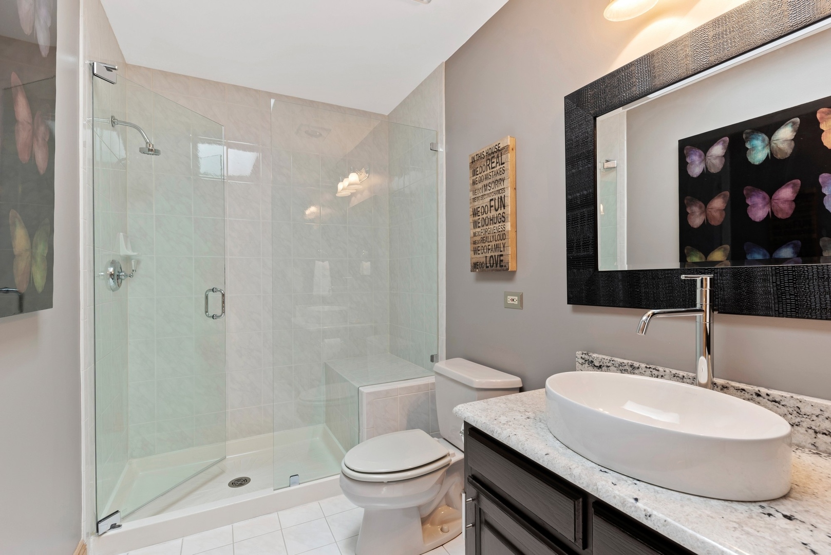 776 North Inverway Road Inverness, IL 60067 - Photo 18 of 31 a bathroom with a sink toilet and shower