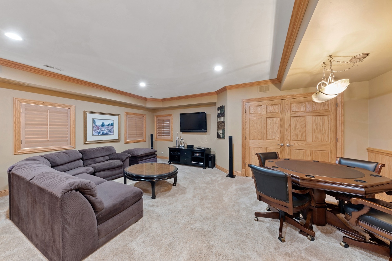 776 North Inverway Road Inverness, IL 60067 - Photo 24 of 31 a living room with furniture a flat screen tv and large window