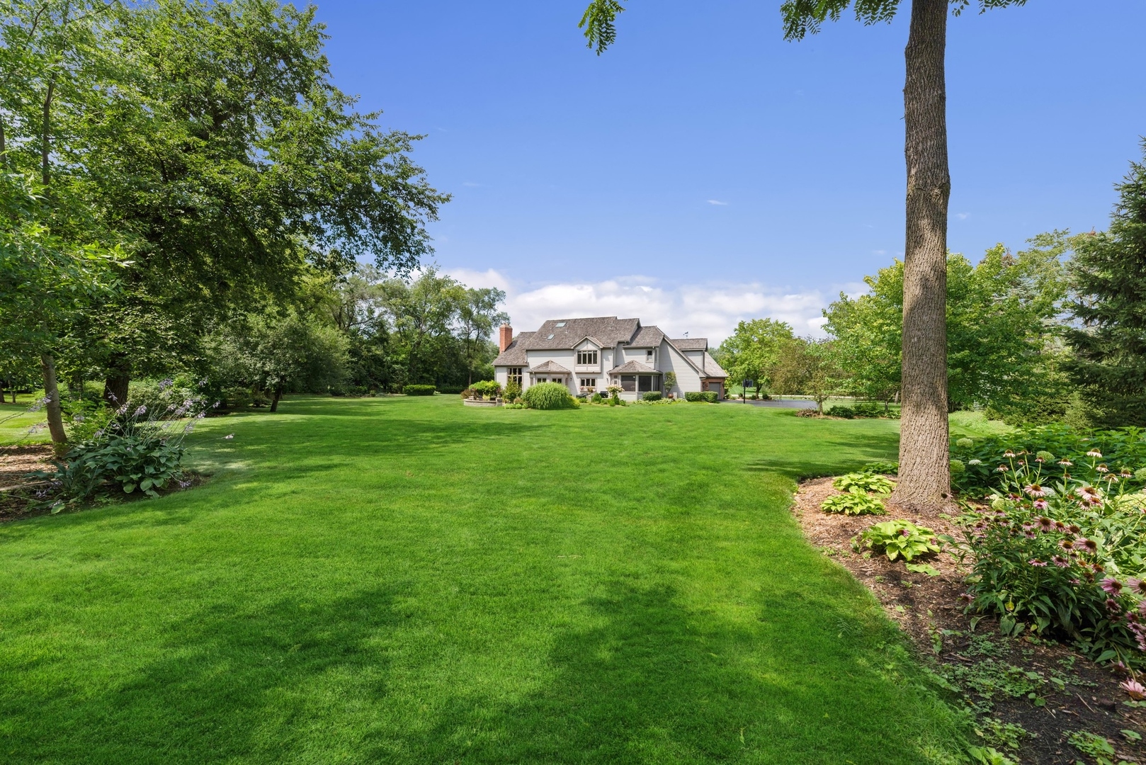 776 North Inverway Road Inverness, IL 60067 - Photo 31 of 31 a view of a garden with a building in front of it