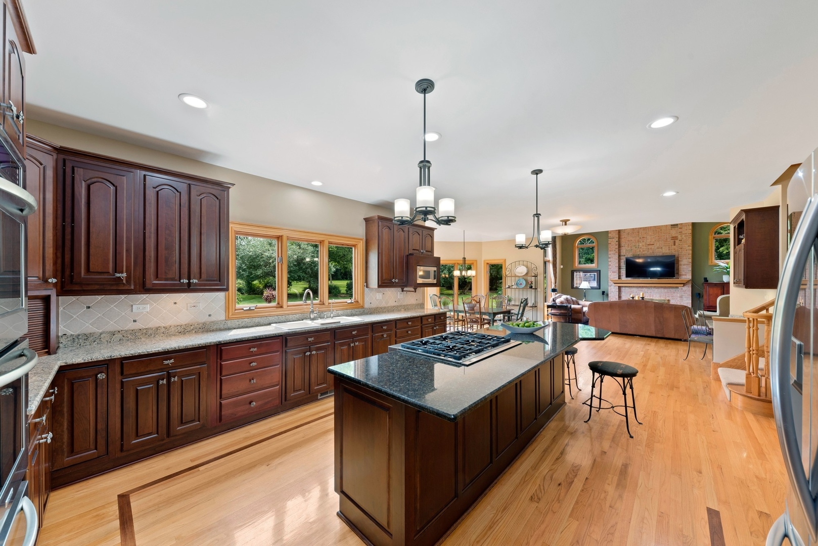 776 North Inverway Road Inverness, IL 60067 - Photo 6 of 31 a kitchen with a stove and a wooden floors