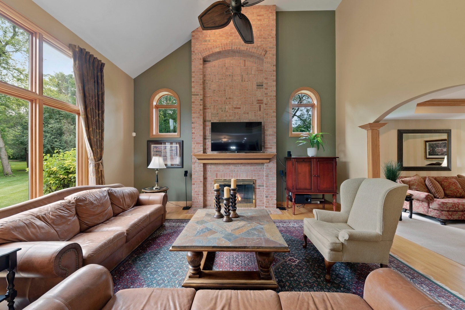 776 North Inverway Road Inverness, IL 60067 - Photo 8 of 31 a living room with furniture fireplace and a large window