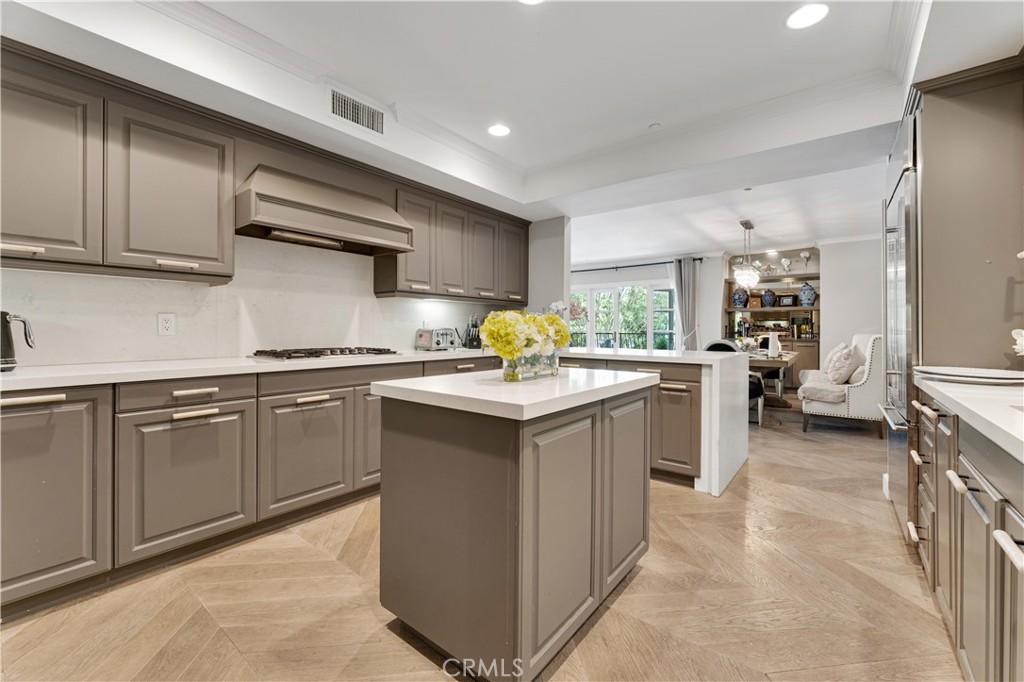 277 South Spalding Drive, Unit 201 Beverly Hills, CA 90212 - Photo 16 of 31 a kitchen with granite countertop a sink and cabinets