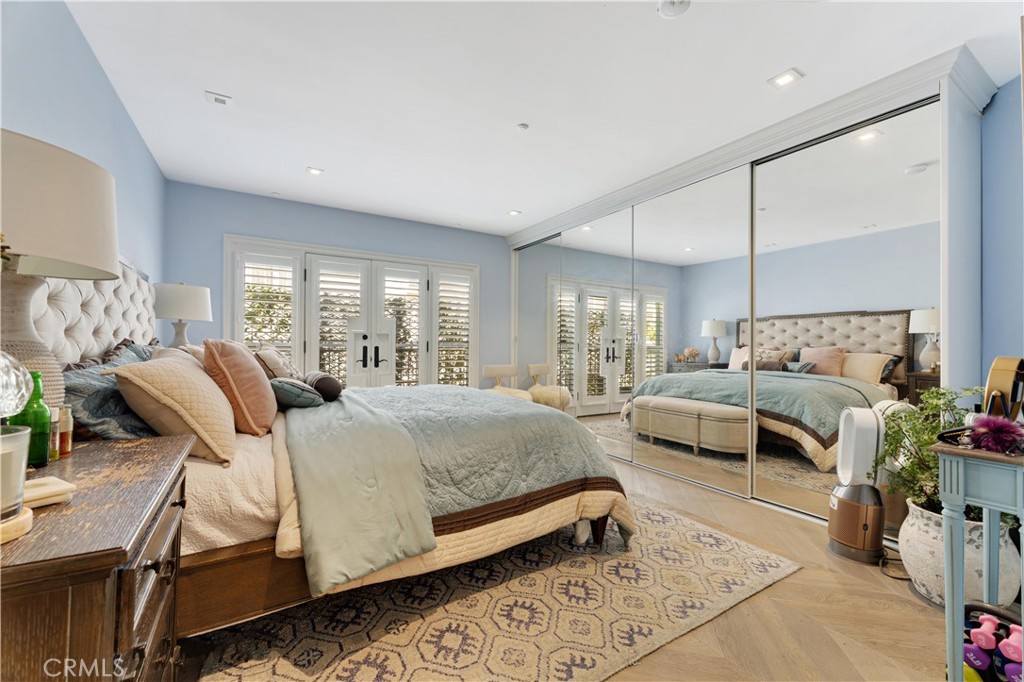 277 South Spalding Drive, Unit 201 Beverly Hills, CA 90212 - Photo 18 of 31 a bedroom with furniture and a couch