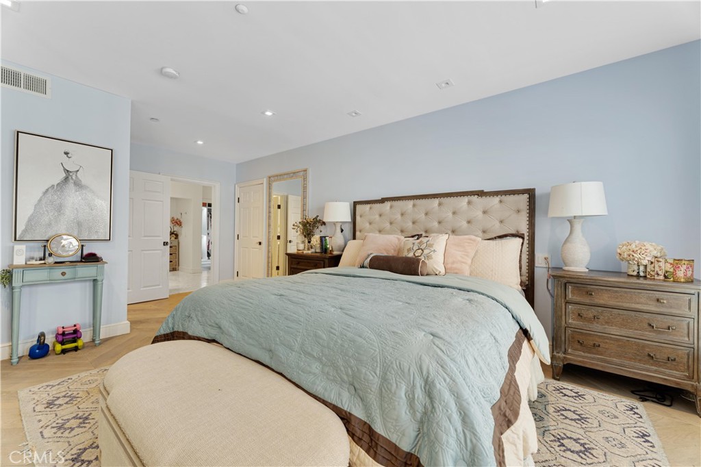 277 South Spalding Drive, Unit 201 Beverly Hills, CA 90212 - Photo 19 of 31 a bed room with a bed and a chair