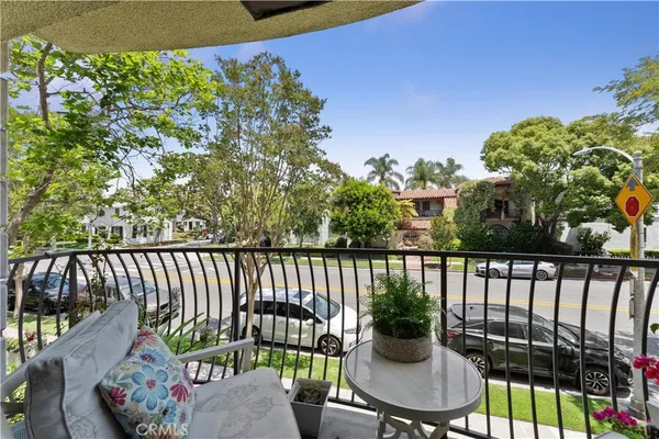 a view of a chairs and table in patio
