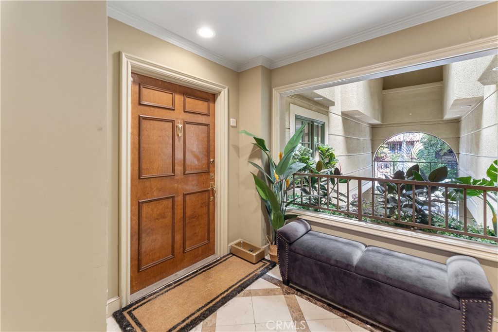 277 South Spalding Drive, Unit 201 Beverly Hills, CA 90212 - Photo 28 of 31 view of living room with furniture