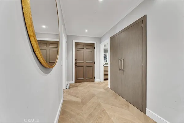 a view of a hallway with washer and dryer