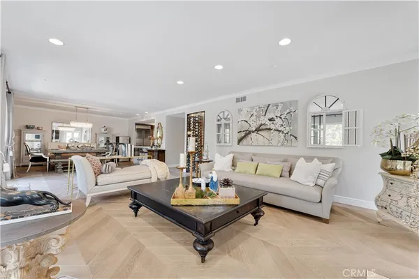 a living room with furniture and rug