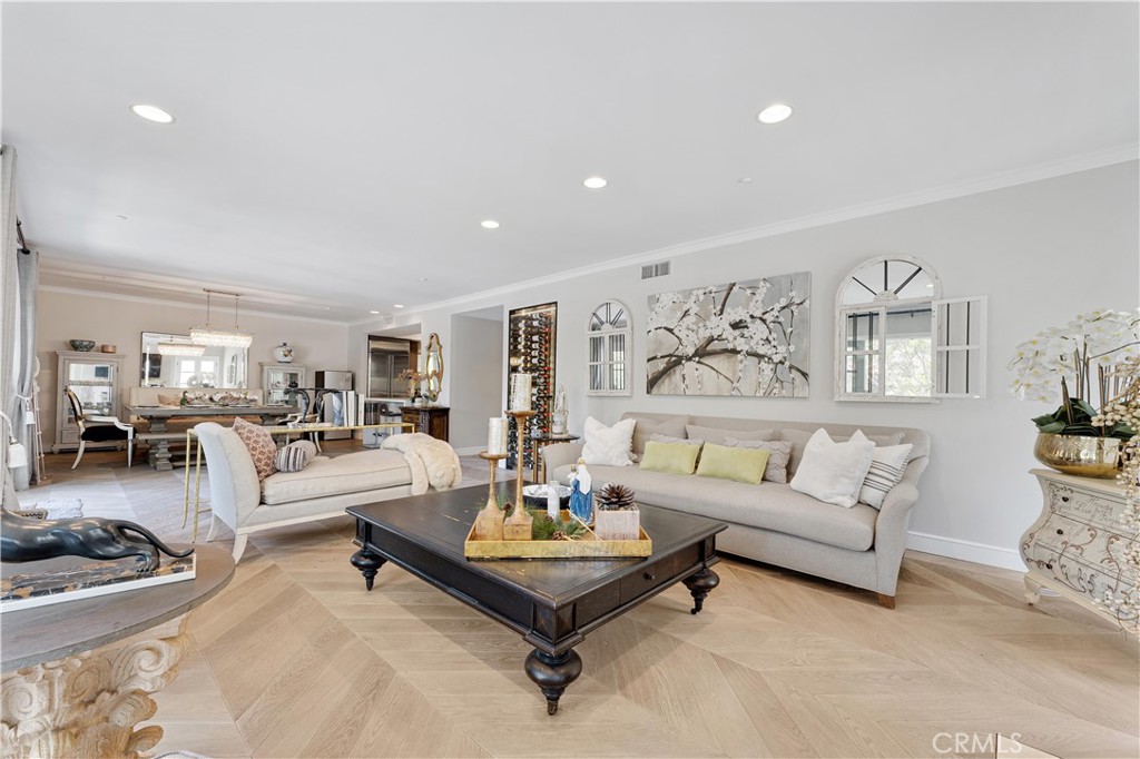277 South Spalding Drive, Unit 201 Beverly Hills, CA 90212 - Photo 7 of 31 a living room with furniture and rug