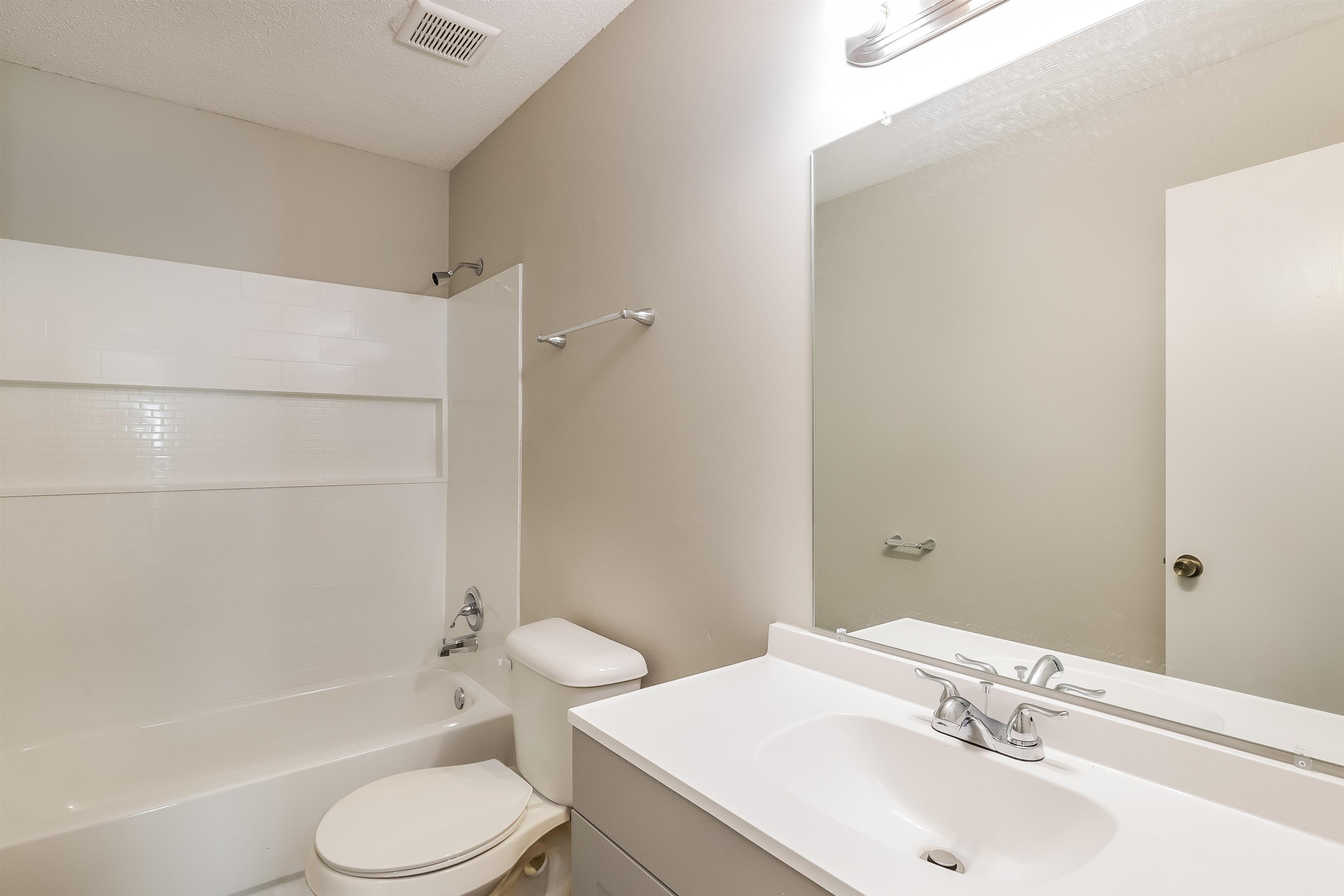 3054 Ridgeway Road Memphis, TN 38115 - Photo 14 of 17 a bathroom with a sink toilet and shower