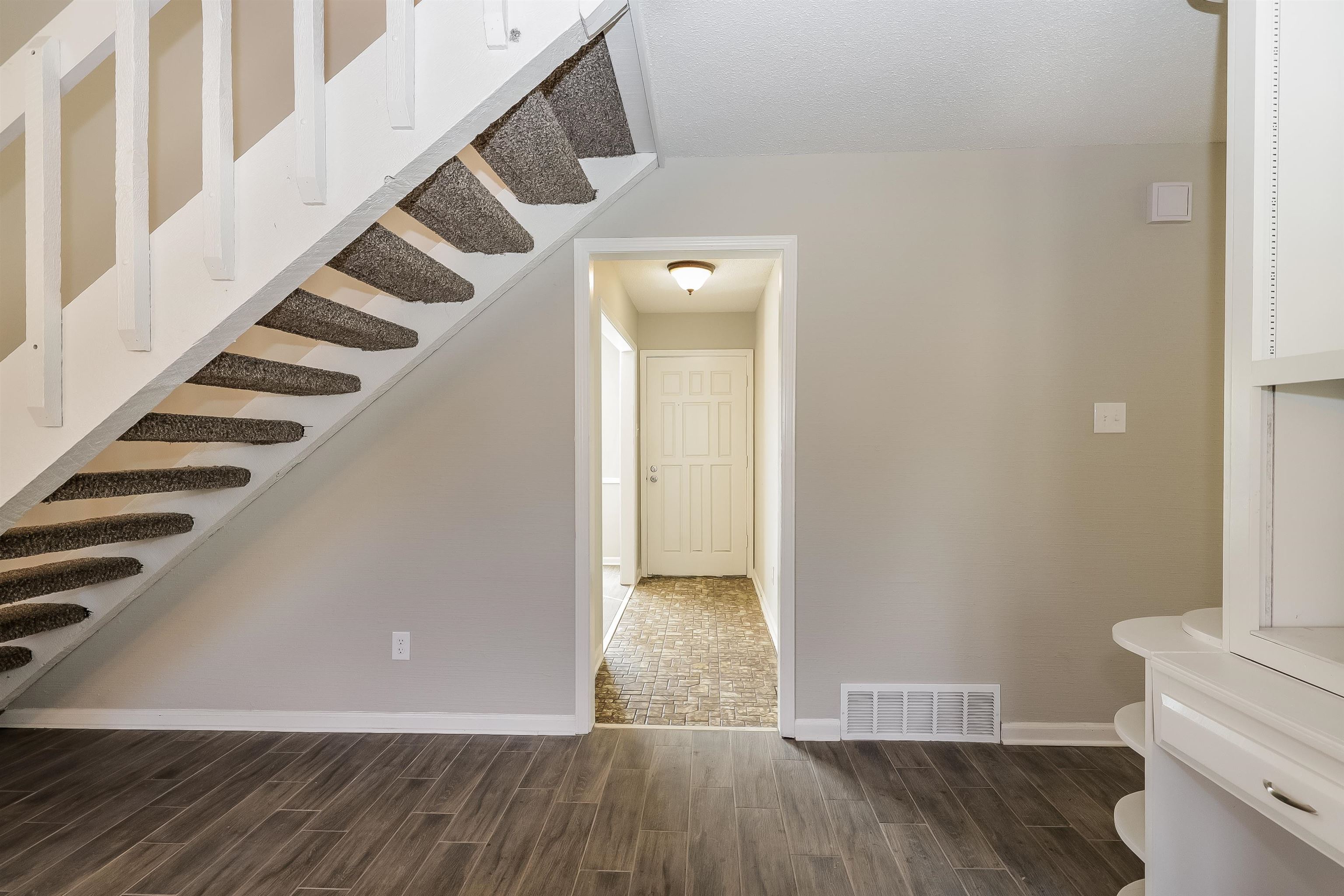 3054 Ridgeway Road Memphis, TN 38115 - Photo 4 of 17 a view of an entryway with wooden floor