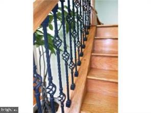 122 Cedar Road Mullica Hill, NJ 08062 - Photo 7 of 11 Hardwood Flooring and Foyer Steps with Rod Iron