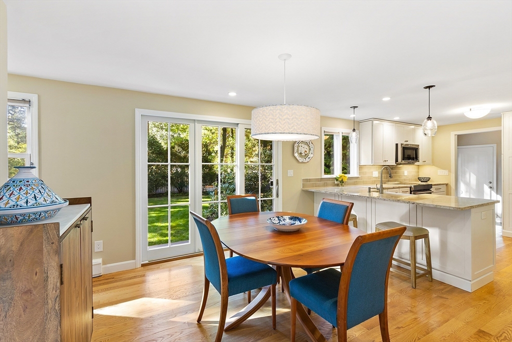 5 Crest Road Natick, MA 01760 - Photo 12 of 36 a view of a dining room with furniture window and wooden floor