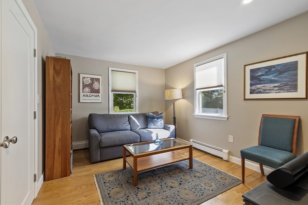 5 Crest Road Natick, MA 01760 - Photo 18 of 36 a living room with furniture and a window