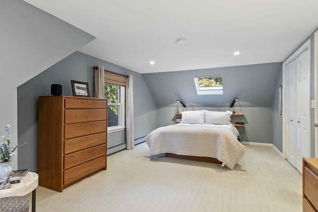 5 Crest Road Natick, MA 01760 - Photo 21 of 36 a bedroom with a bed and a dresser