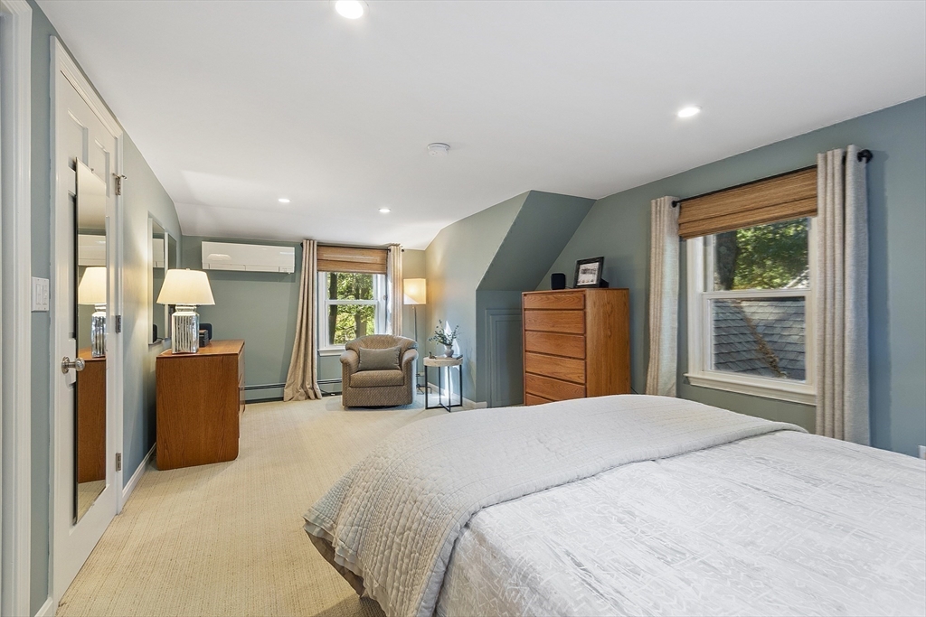 5 Crest Road Natick, MA 01760 - Photo 22 of 36 a bedroom with a large bed and a large window