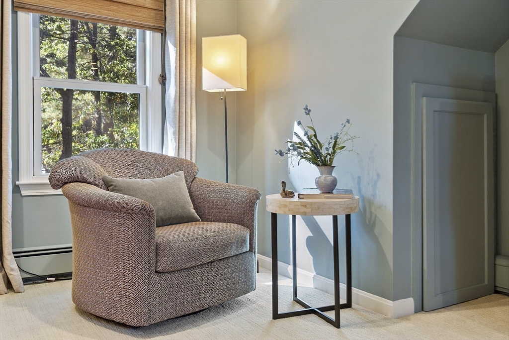 5 Crest Road Natick, MA 01760 - Photo 23 of 36 a living room with furniture and a potted plant