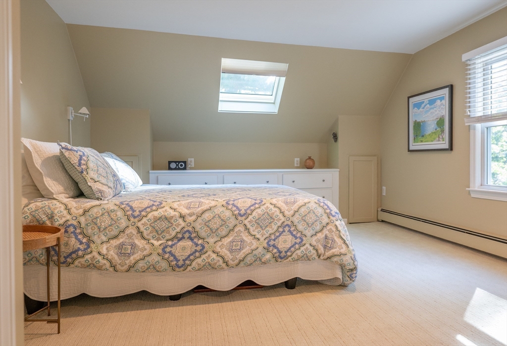 5 Crest Road Natick, MA 01760 - Photo 24 of 36 a bedroom with a bed and window