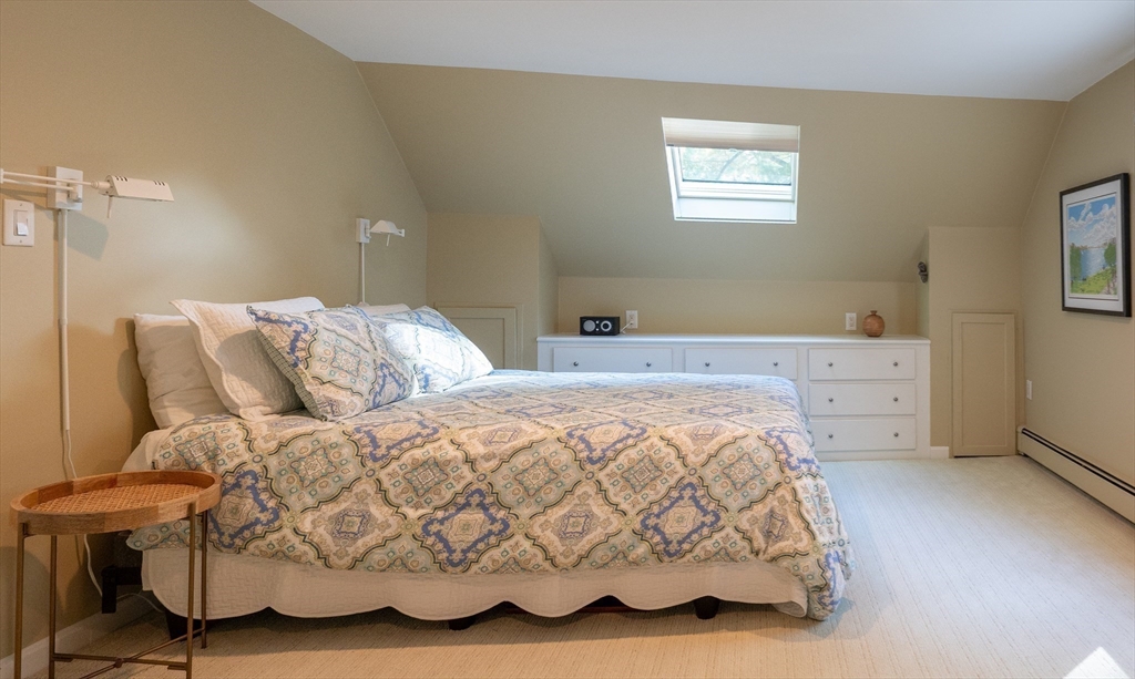 5 Crest Road Natick, MA 01760 - Photo 25 of 36 a bedroom with a bed and window