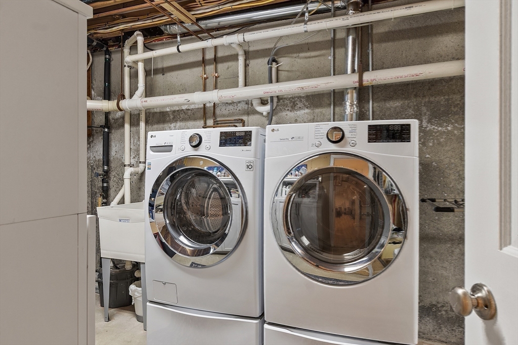 5 Crest Road Natick, MA 01760 - Photo 28 of 36 a utility room with dryer and washer