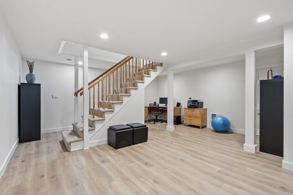 5 Crest Road Natick, MA 01760 - Photo 29 of 36 a view of entryway and hall with wooden floor