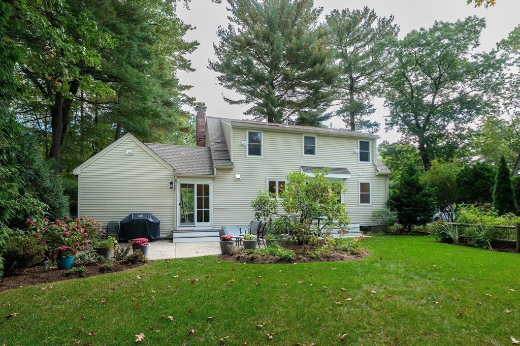 5 Crest Road Natick, MA 01760 - Photo 33 of 36 a view of a house with backyard and garden