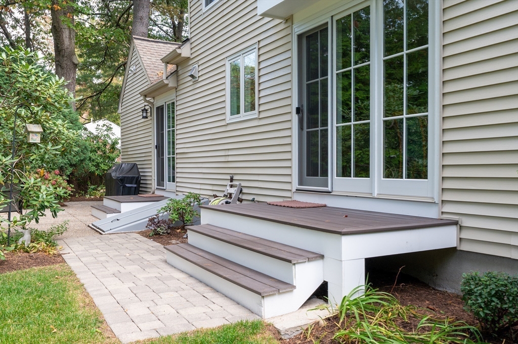 5 Crest Road Natick, MA 01760 - Photo 34 of 36 a view of house with backyard and sitting area