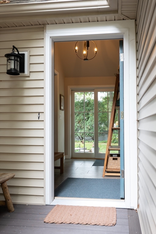 5 Crest Road Natick, MA 01760 - Photo 5 of 36 a view of front door and deck of the house